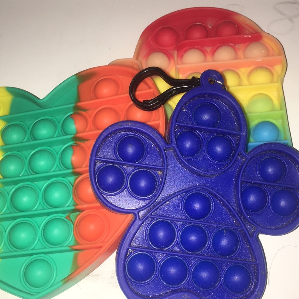 Popit heart 3 colors & an paw patrol pop it blue then a rainbow among us pop it